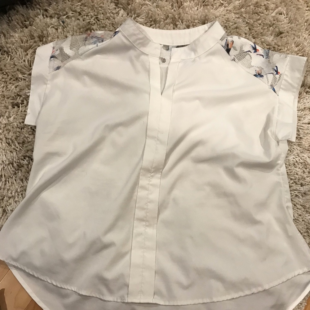 White blouse with decorative birds